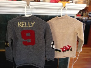 The Kelly sweaters seen from the back