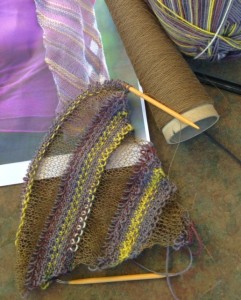 Pattern is "Diagonal Ribbons", designed by Karen Bradley. Knitter's Magazine K112, page 34.  Yarn is LB Collection Stainless Steel, Color 123 Khaki, and LB Sock Ease, Color 201. 