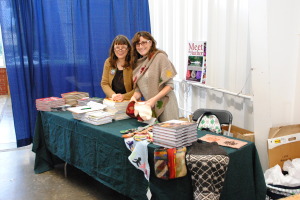 Marcia took this photo of me and my table partner, Wendy Johnson, setting up the table at Rhinebeck.