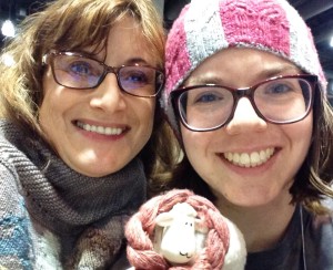 Re-united with Sarah Jaworowicz, who book designer for "Annetarsia Knits".  She worked in the Dizzy Sheep/Village Yarn and Fiber booth, and we are posing with Dizzy, who you may recognize from his commentary in pages of the book. 