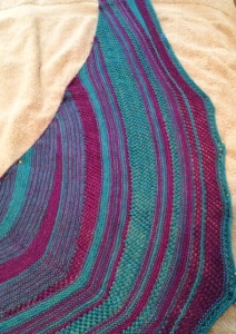 Here is Off-kilter, off the needles and blocking. The patterning is simple, just garter stitch and a basic mesh.  But the random short rows and changing of color create quite an interesting result (now that it is not crammed on the needles and I can see it!)