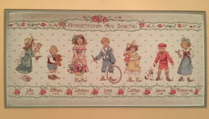 Hanging in the Berk house, a needlepoint sampler I made for Mom, with all of the grandkids and their birthdays. 