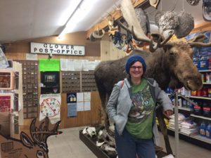 The Glover Post Office is located inside the store, near the full sized moose behind Donna.