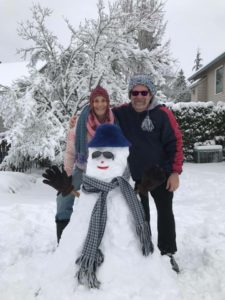 Anne and Bill wanted to build a snowman! Everything except Bill's coat and the snowman's gloves are knitted.