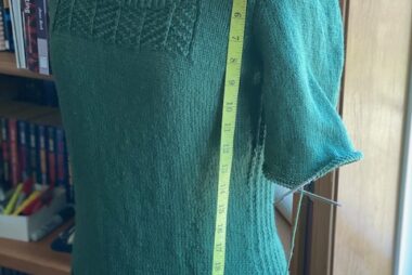 unblocked sweater body, 3 inches longer than the pattern calls for, to allow for expected shrinkage.